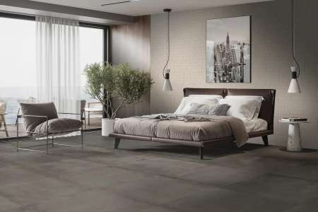Světle šedá ložnice z dlažby Gambiny XO Cement 60x60