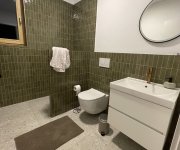 Realizace koupelny naší zákaznice Saime Frammenta Bianco v kombinaci s Equipe Coco Verd