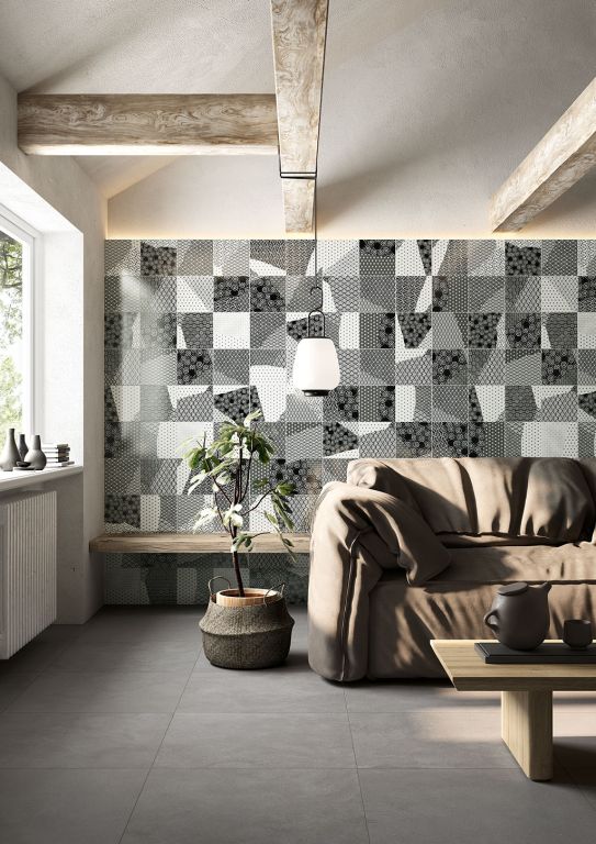 Realizace Obývací pokoj s černobílými obklady a šedou dlažbou ze série Fioranese Kintsugi.