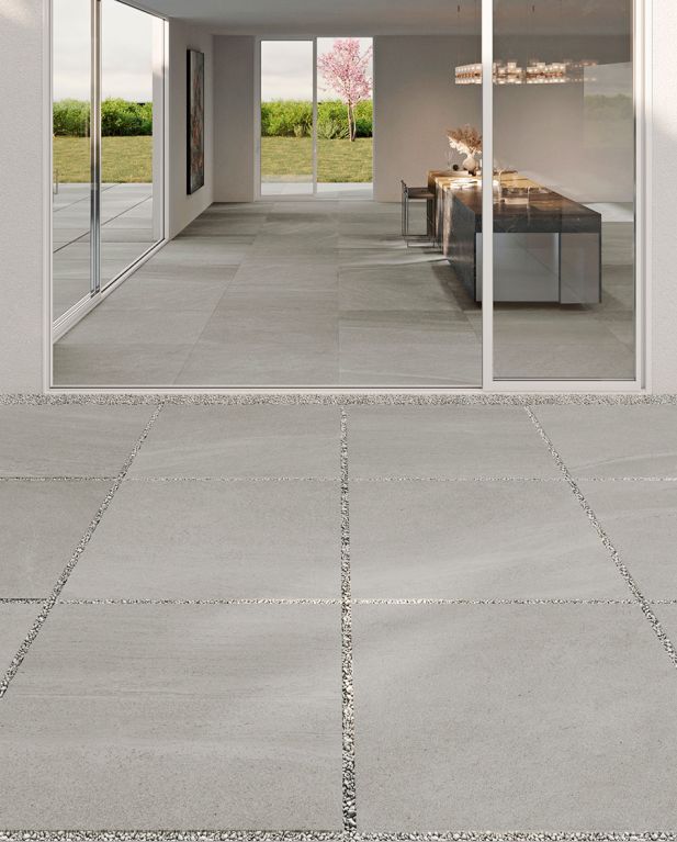 Realizace Šedá 2 cm dlažba na terase ze série Tuscania Limestone.