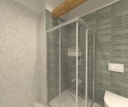 Zelenobéžová koupelna s dlažbou jako kámen Navarti Nadinne Blanc a obkladem Equipe Wadi Decor Mint