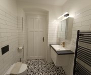 Realizace Del Conca Cementina Black and White v koupelně naší zákaznice