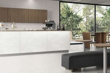 Dlažba Charme Pure v komerčním prostoru, na podlaze 80x80, na baru dekor Levels (EdimaxAstor)