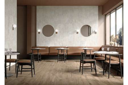 bíle obklady s kovovým vzhledem na zdi restaurace ze série Mariner Sanctuary.