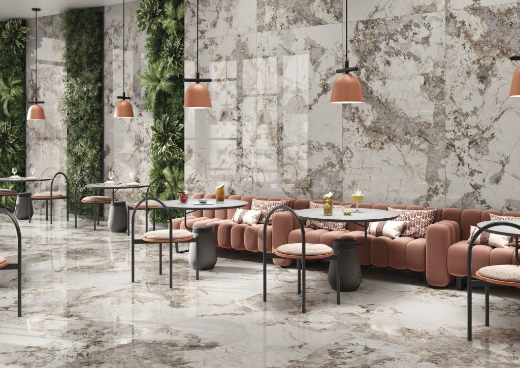 Realizace Restaurace s mramorovými obklady a dalžbou ve zlatém nádechu ze série Cifre Esplendor.