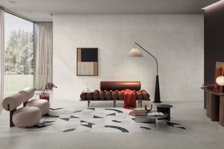 Obývací pokoj s kombinací obkaldu a dlažeb ze série La Fenice Marble Velvet.