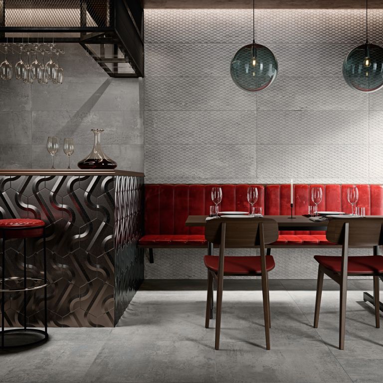 Realizace Interiér restaurace s šedými obklady a dlažbou ze série Aparici Metallic.